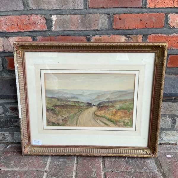 Framed signed watercolour of a winding track through Welsh valleys