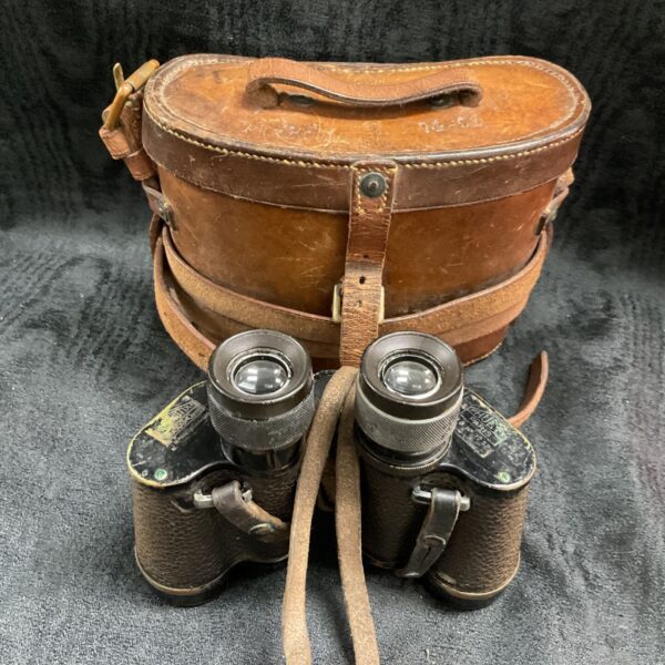 Vintage French military binoculars with leather case dated 1927.