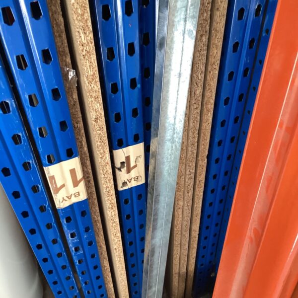 Metal garage shelving bay section, approximately 2.5m high.