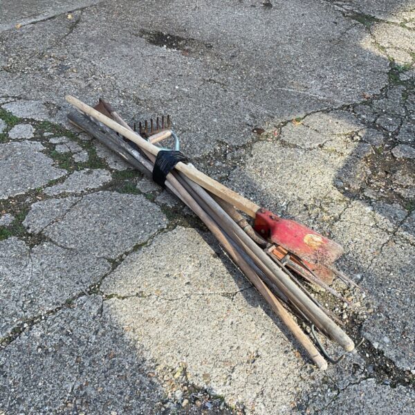 Vintage garden tool bundle including a spade and fork.