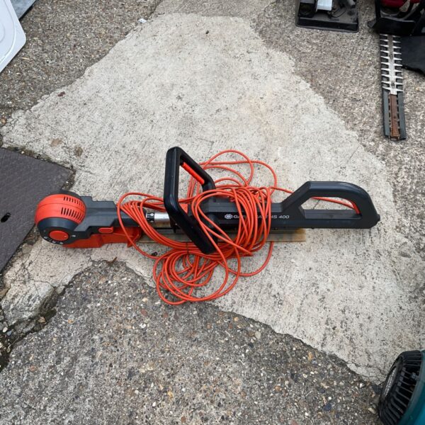 Used Gardena electric hedge trimmer with visible power cable.