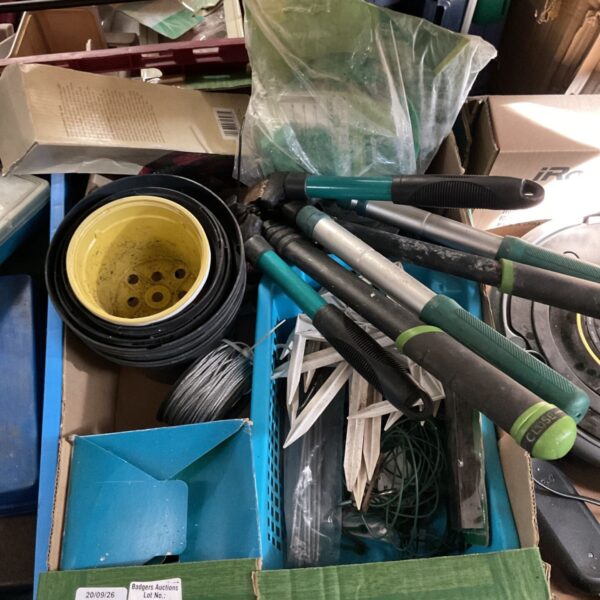 Mixed lot of gardening tools and accessories including plant pots and loppers.