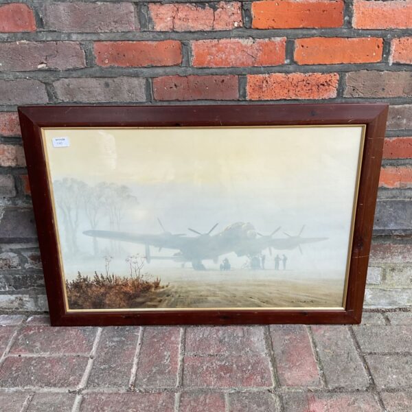Framed Gerald Coulson print of Lancaster bomber on misty airfield
