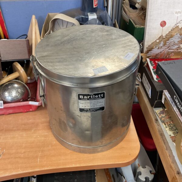 Vintage G.F. Bartlett metal food container, model 852, for kitchen storage.