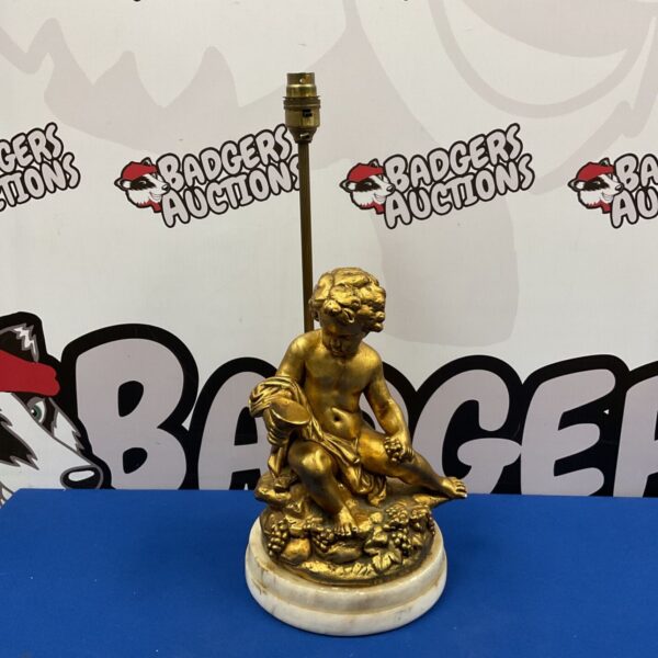 Vintage gilded putti table lamp base on marble.