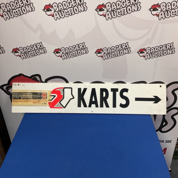 Vintage go kart racing sign with 1993 Silverstone Grand Prix ticket.