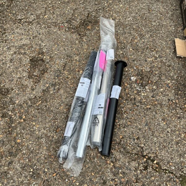 Four new Goodhome worktop legs in plastic packaging.