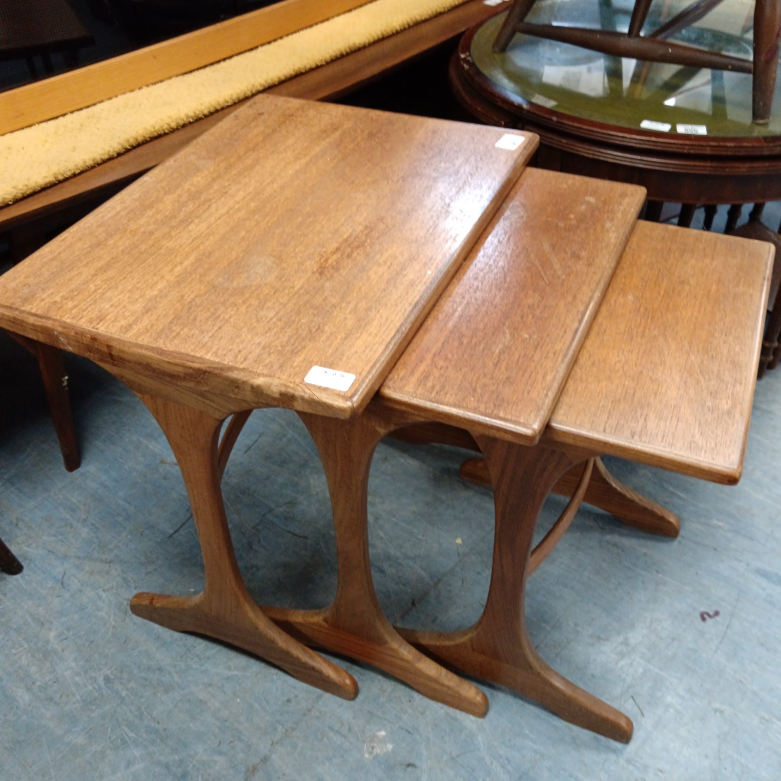 Vintage Gplan nest of tables in warm wood tone.