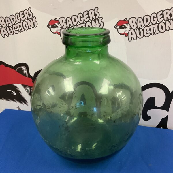 Vintage green glass carboy bottle, ideal for terrariums and home decor.