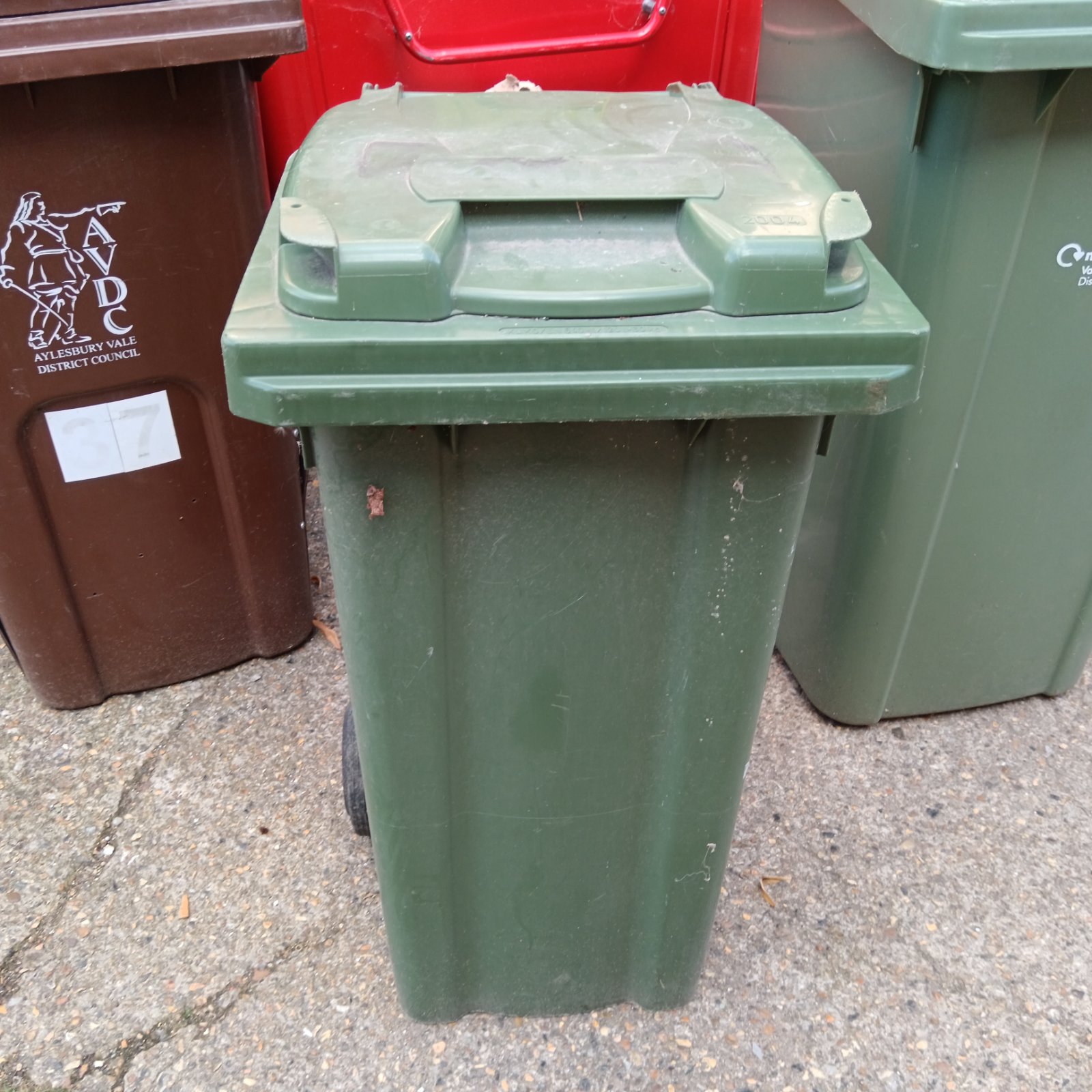 Small green wheelie bin with Aylesbury Vale Council logo.