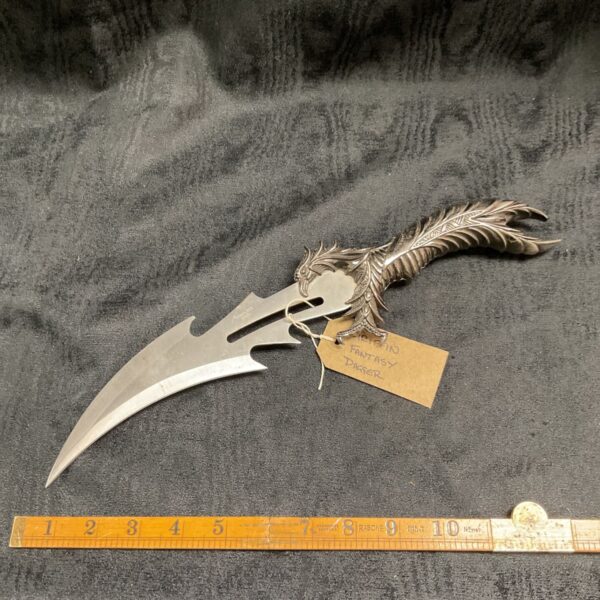 Detailed griffin fantasy dagger with sculpted handle and stainless steel blade.