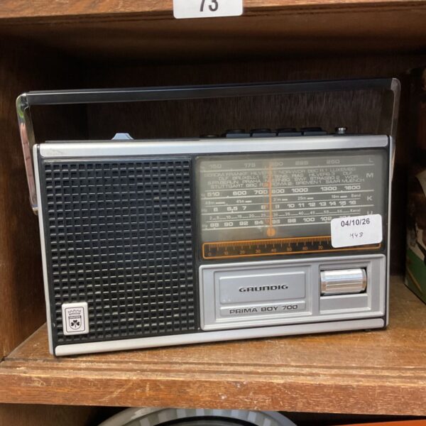 Vintage Grundig Prima Boy 700 radio in wooden cabinet.