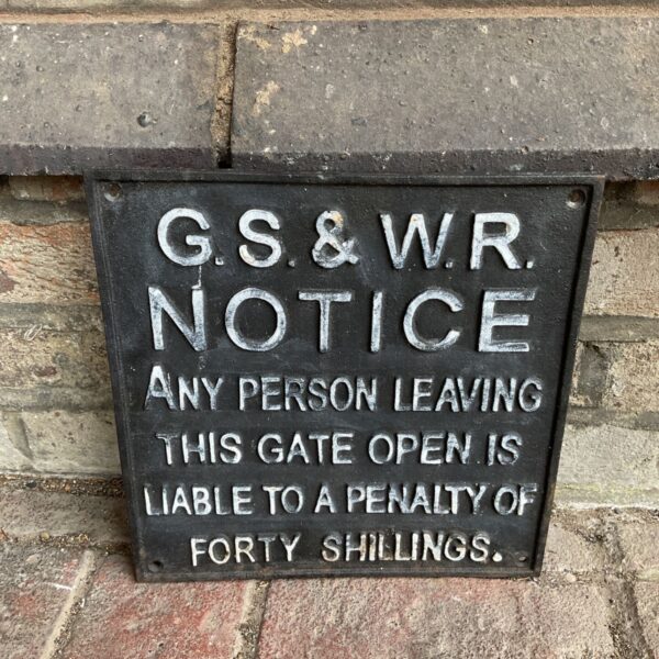 Vintage GSW Railway gate notice warning of penalty.
