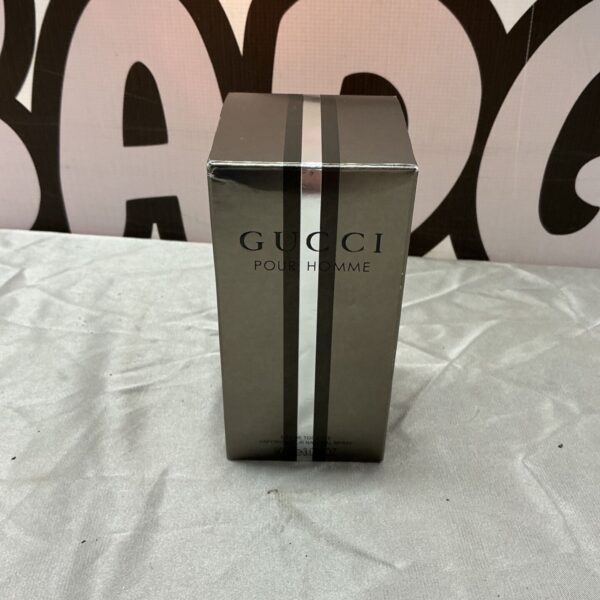 Boxed Gucci Pour Homme Eau de Toilette with silver and dark striped design