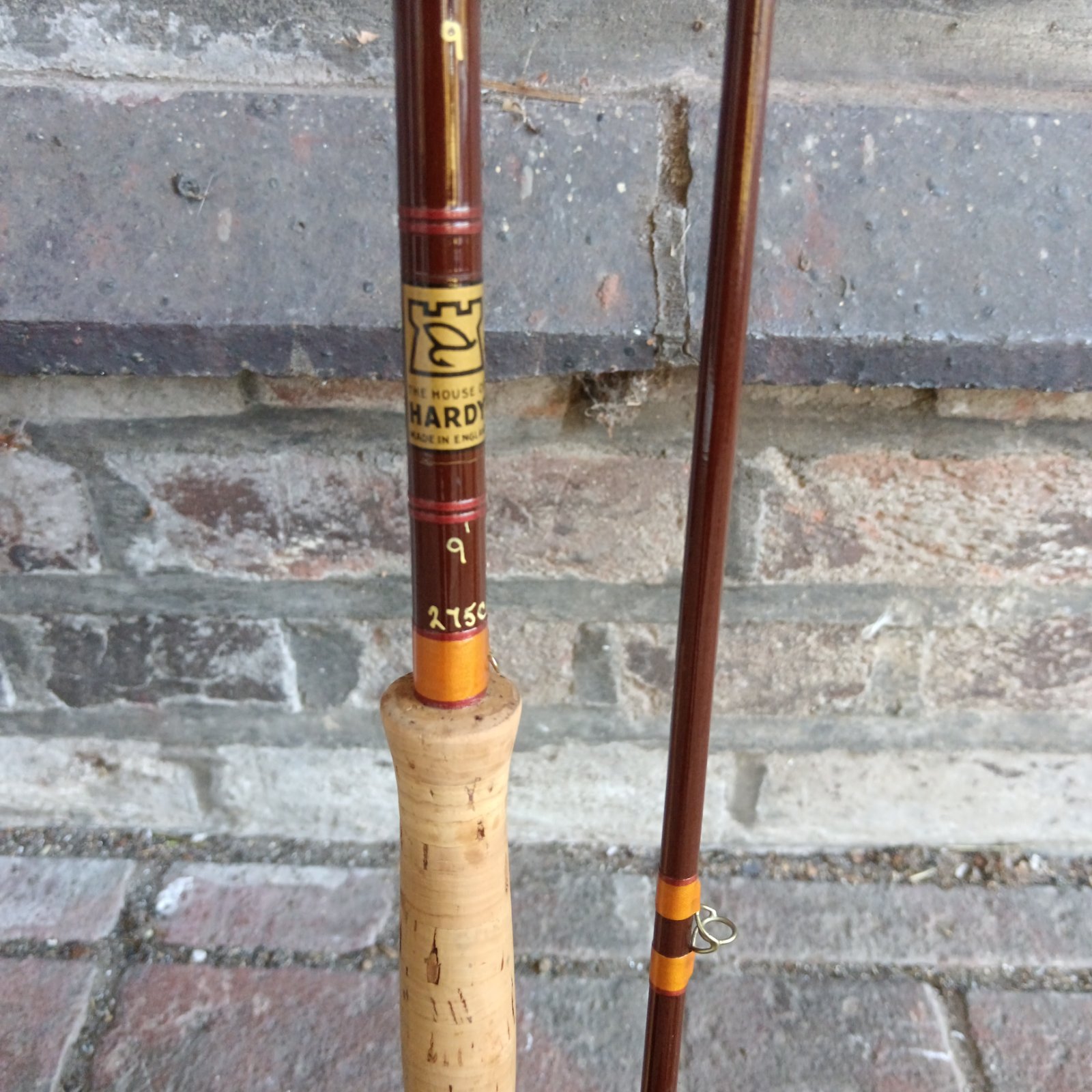 Close view of Hardy #9 fly rod blank with Hardy label and cork handle