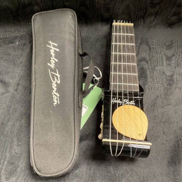 Harley Benton guitar practice tool for finger dexterity and chord learning.