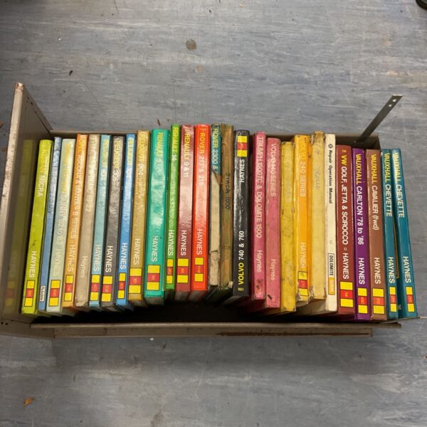 Collection of vintage Haynes car manuals for Renault, Peugeot and Nissan.