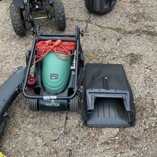 Used Hayter electric mower in a garden setting.