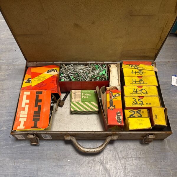 Assorted Hilti gun spits in a metal carrying case.