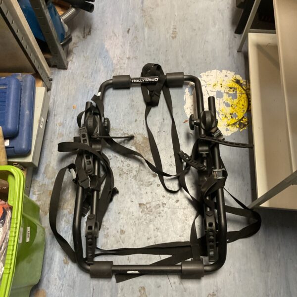 Black Hollywood Express 3-bike trunk mount rack with adjustable straps and padded cradles