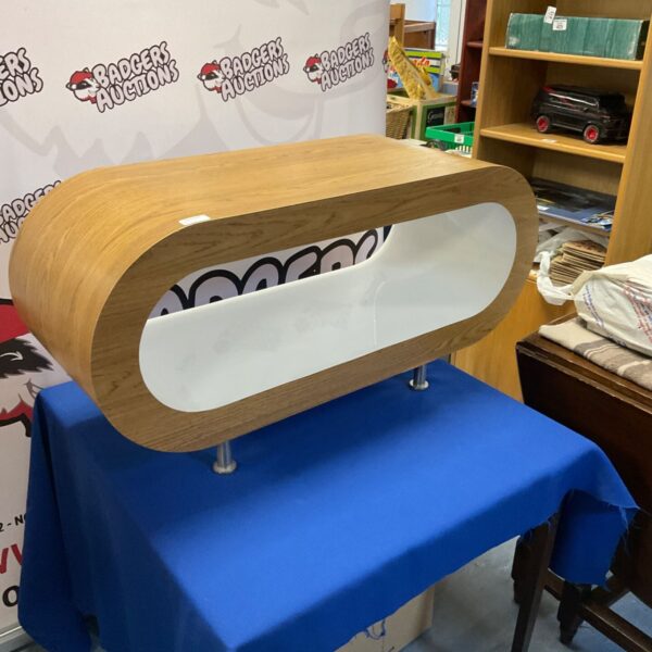 Modern oak effect hooped TV stand for living room entertainment.