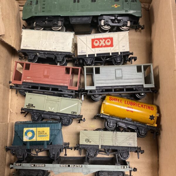 Hornby OO gauge train set with diesel locomotive and Shell wagon.