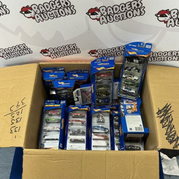 Lot of Hot Wheels gift packs with five cars each.