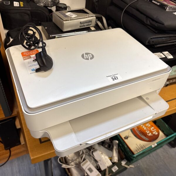 HP Envy 6020E printer in used condition, side view.