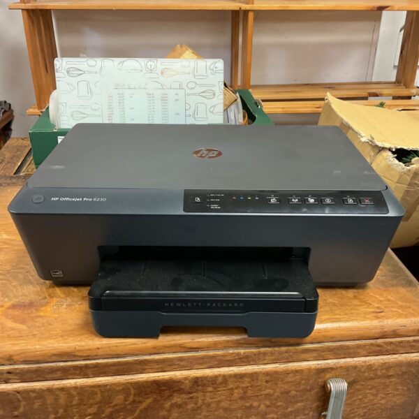 HP OfficeJet Pro 6230 printer in black on a wooden surface