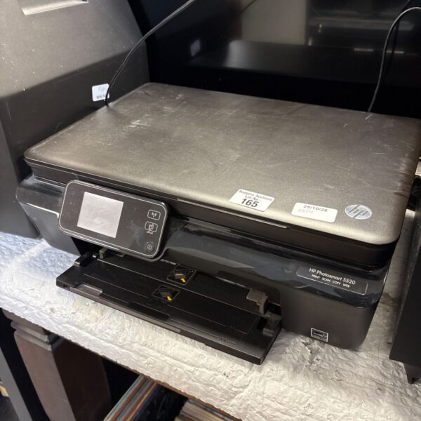 Black HP Photosmart 5520 e-All-in-One inkjet printer with control panel and paper tray
