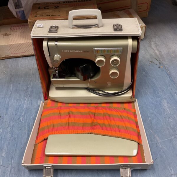 Vintage Husqvarna 2000 sewing machine in its original case.