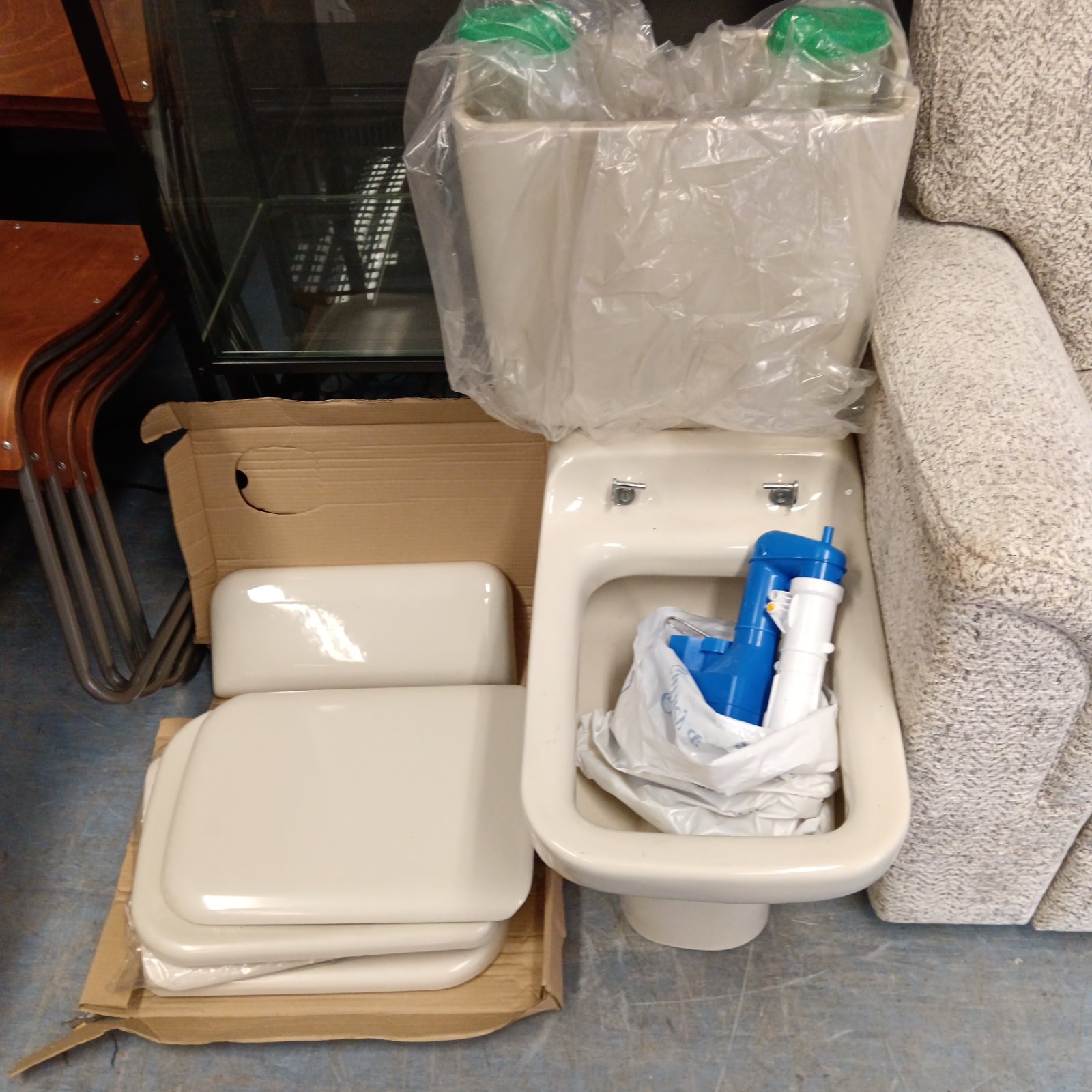 Vintage Ideal Standard toilet basin with back box, needing restoration.