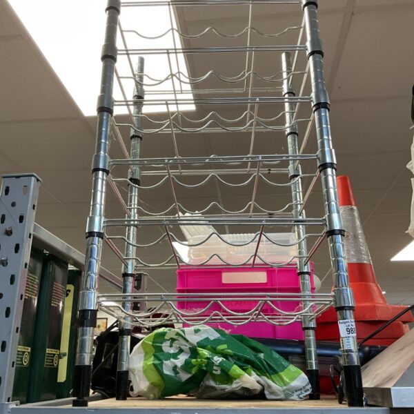 Ikea OMAR bottle shelf unit, a tall metal wine rack.