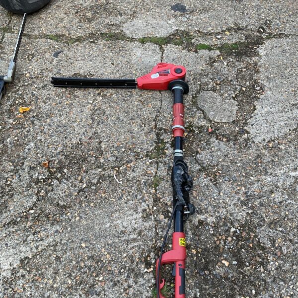 Ikra Mogatec electric hedge trimmer with long reach handle.
