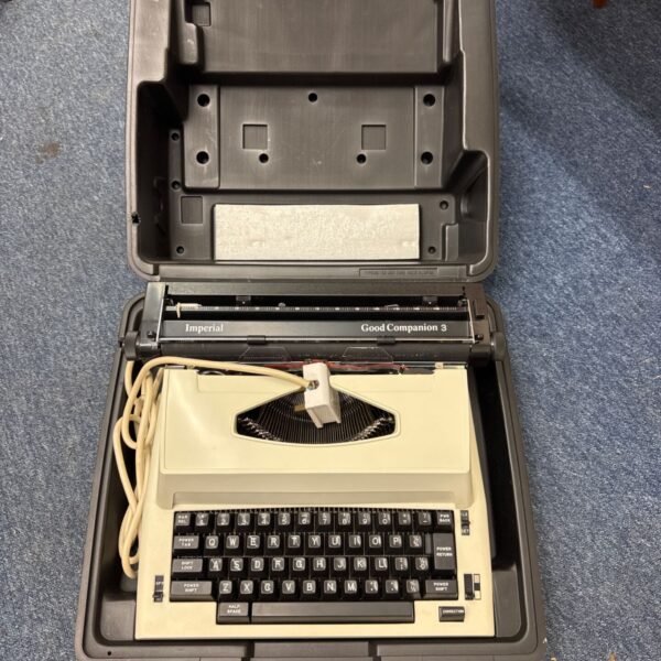 Vintage Imperial Good Companion 3 electric typewriter in open black carry case