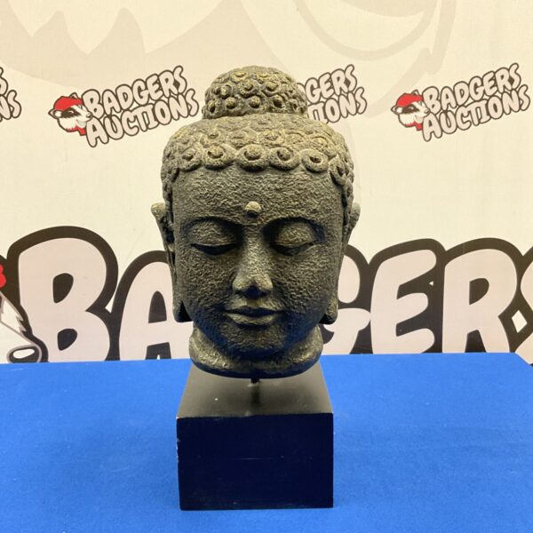 Indonesian fibreglass Buddha head bust with textured finish on black base