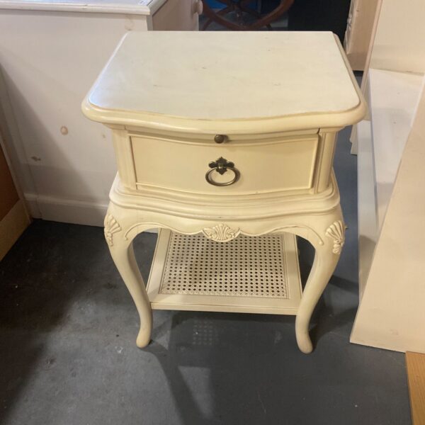 Ivory single drawer nightstand with cabriole legs and cane undershelf