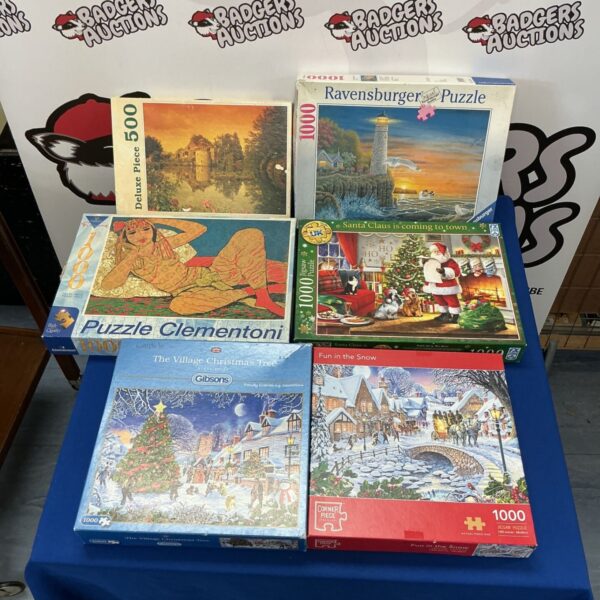Lot of six vintage jigsaw puzzles including Gibsons and Ravensburger brands.
