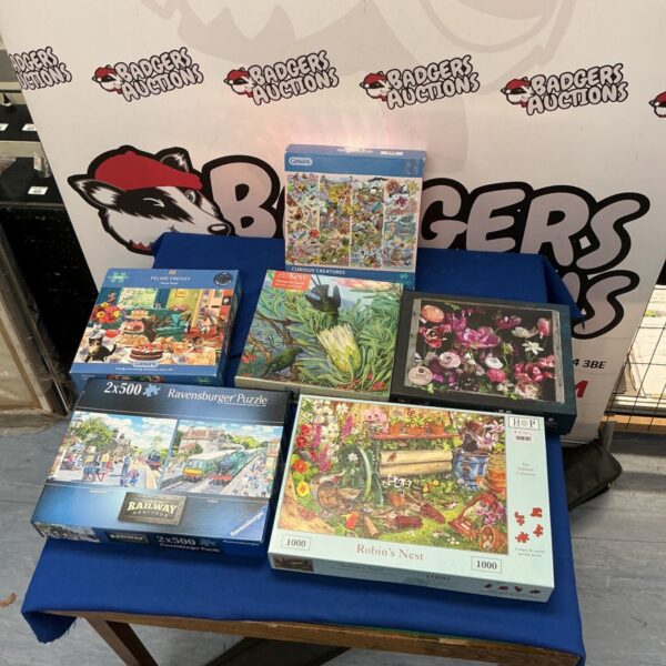 Mixed lot of six jigsaw puzzles including Gibsons and Ravensburger brands.