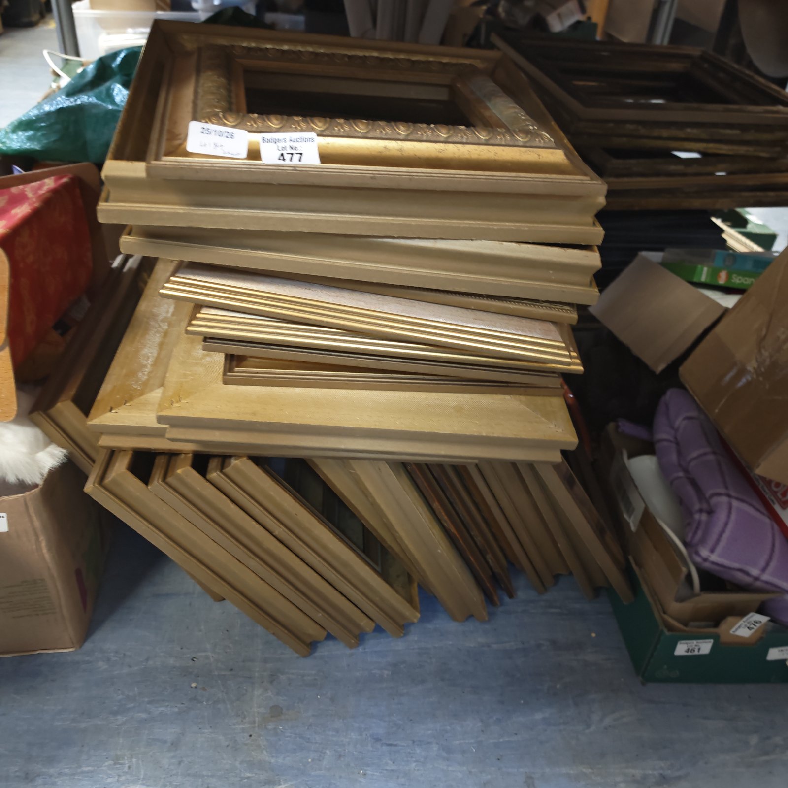 Stacked job lot of mixed gilt and gold-toned picture frames