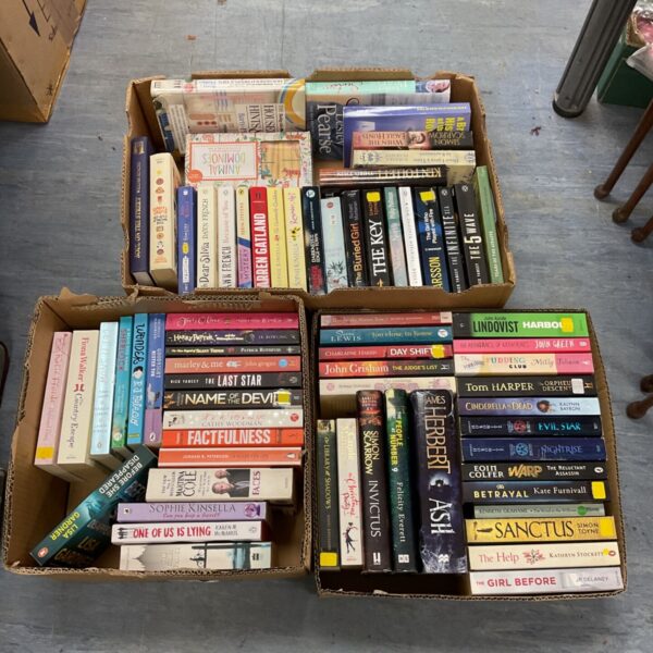 Three boxes of mixed fiction books including John Grisham novel