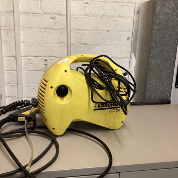 Yellow Kärcher K 2.09 electric pressure washer with coiled mains cable