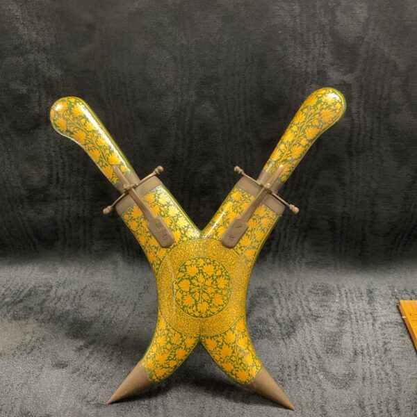 Antique Kashmiri dagger and fork set with floral lacquer decoration.