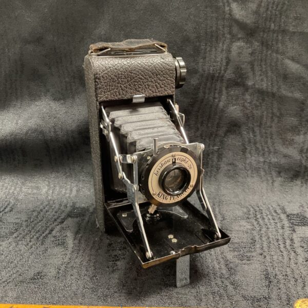 Vintage Kershaw Eight-20 King Penguin folding camera with extended bellows and lens