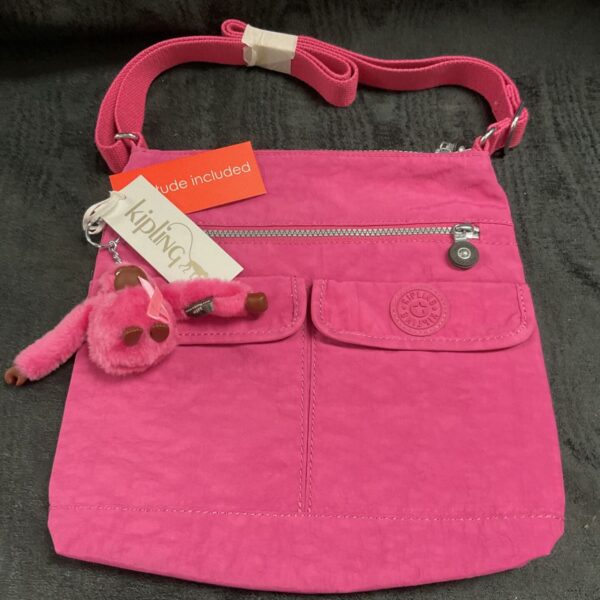 Pink Kipling Carmine shoulder bag with ape charm and tags