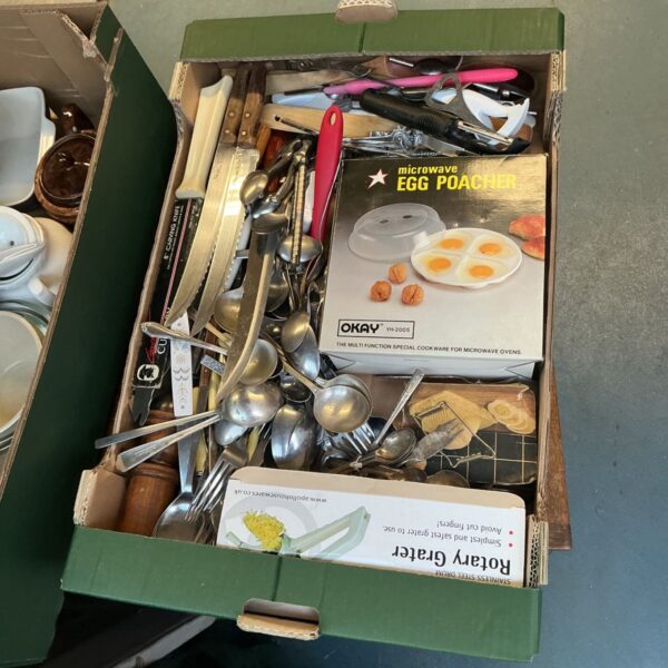 Assorted kitchenware and cutlery lot with egg poacher and grater.