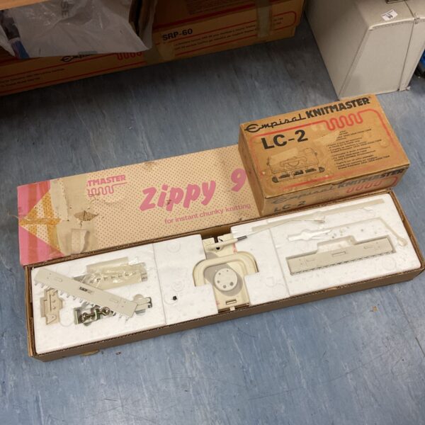 Vintage Knitmaster Zippy 90 chunky knitting machine in original packaging.