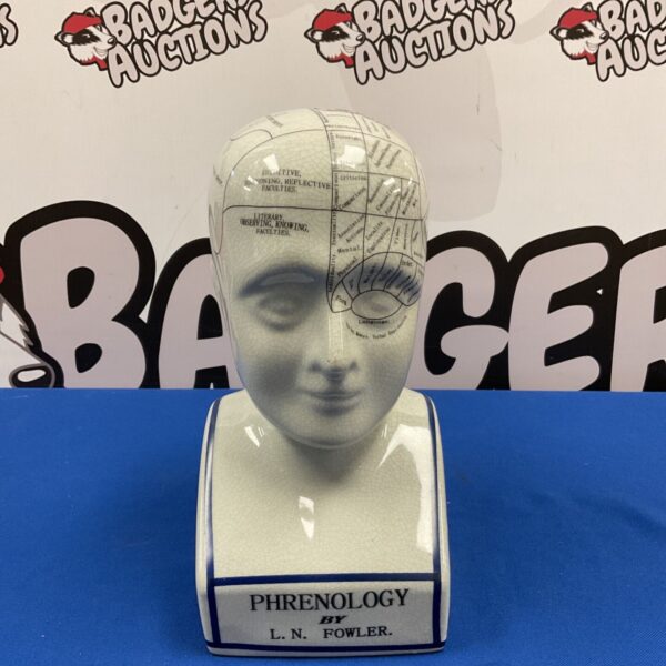 Front view of L. N. Fowler ceramic phrenology bust with faculty chart