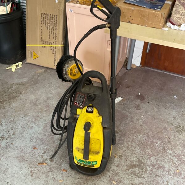Yellow Labour power washer with cleaning attachments for garden use.