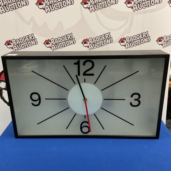 Large rectangular illuminated wall clock with black frame and red second hand